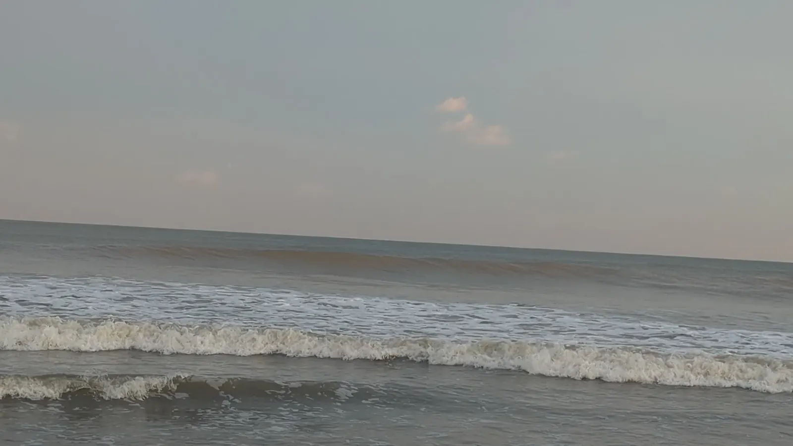 Waves breaking at sunrise